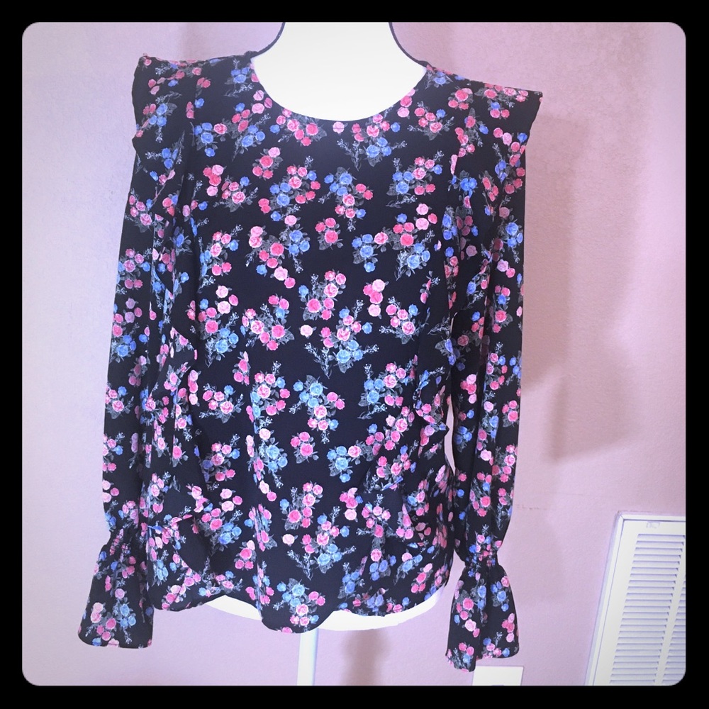 Floral on black ruffle front long sleeved blouse